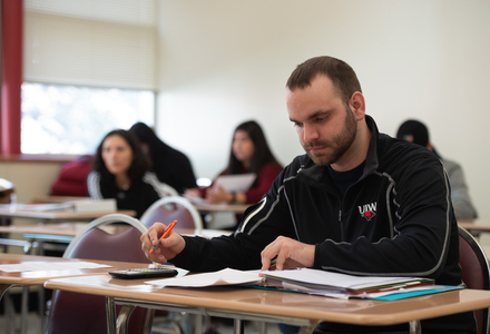 student studying in a classroom