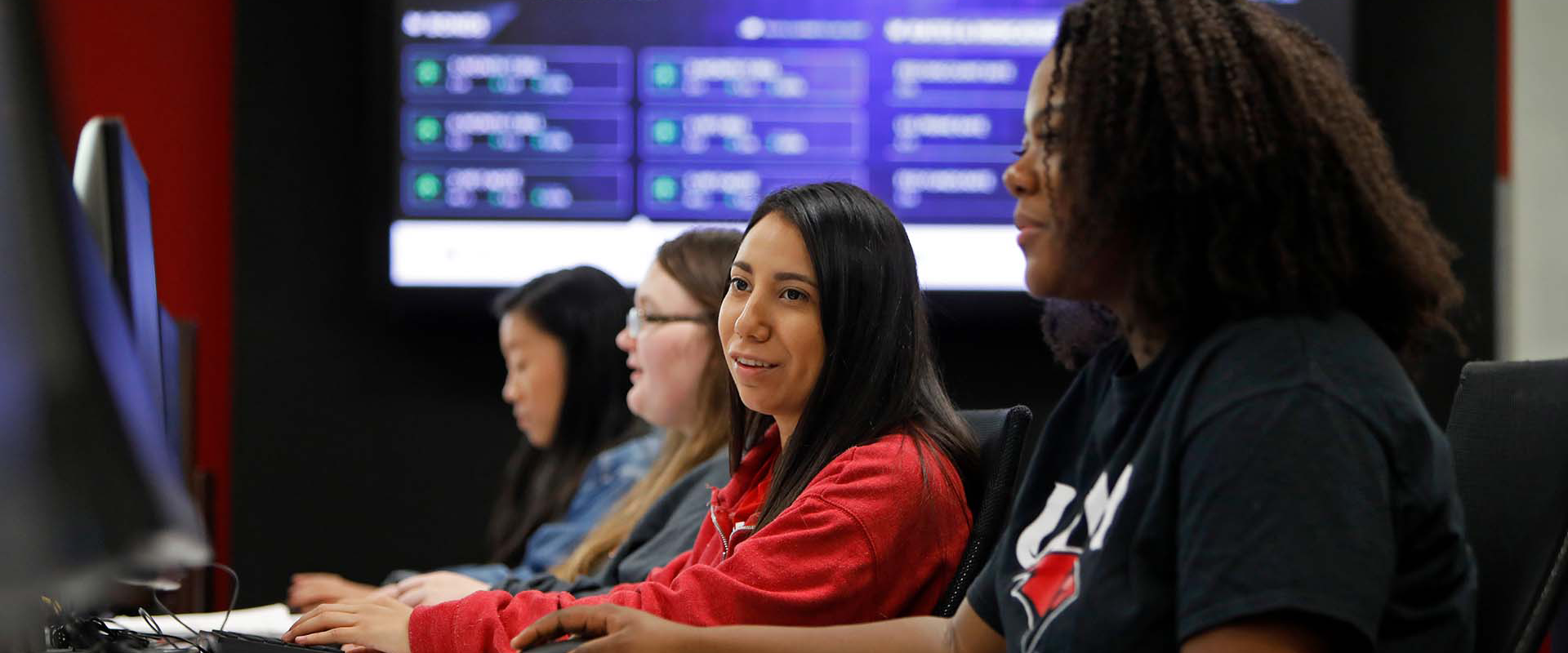 Four UIW Students working in their classroom