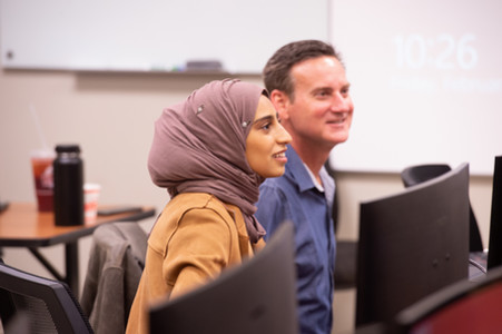 student sitting in class looking attentive