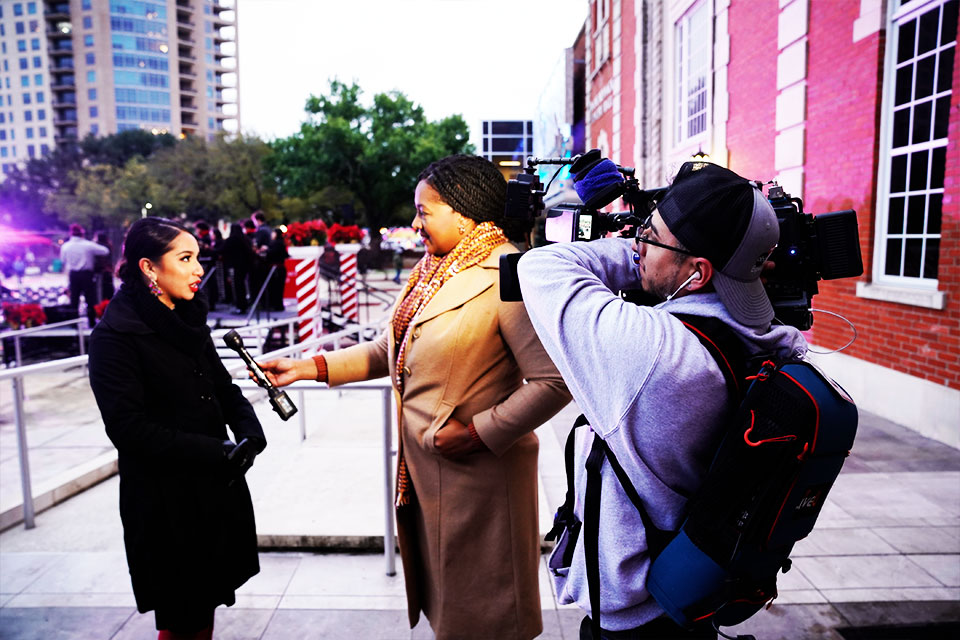 News cameras and interview