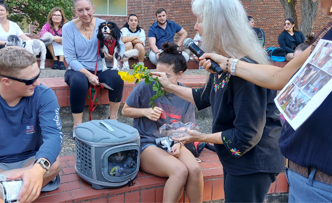 Sister Martha Ann Kirk blessing a cat