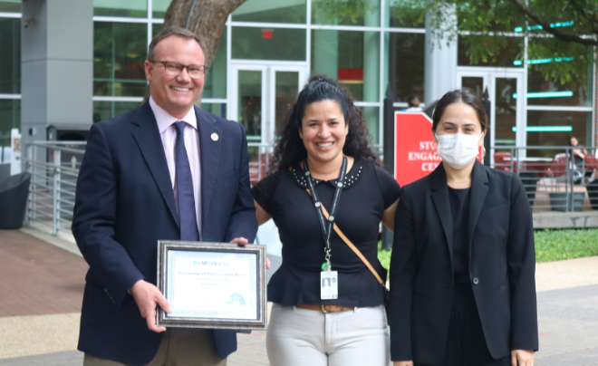 UIW President Dr. Thomas M. Evans accepts the Silver Certification from the City of San Antonio