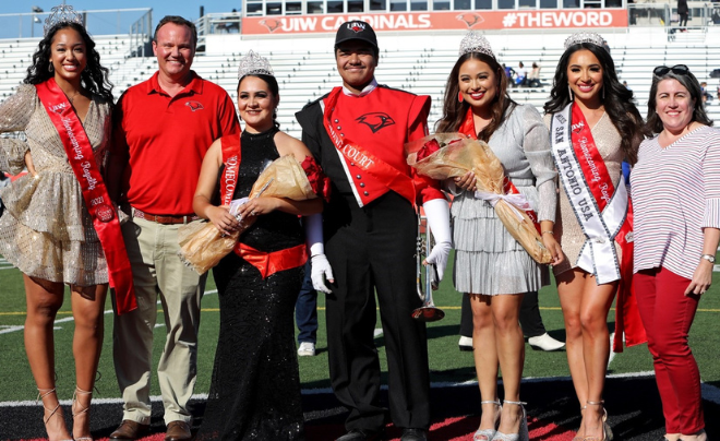 Homecoming court: (L-R) Tiana DeVaughn, UIW President Dr. Thomas M. Evans, Brianna Rivera, Thomas Hill, Julianna Sandoval, Abigail Velez, Mrs. Lisa Evans