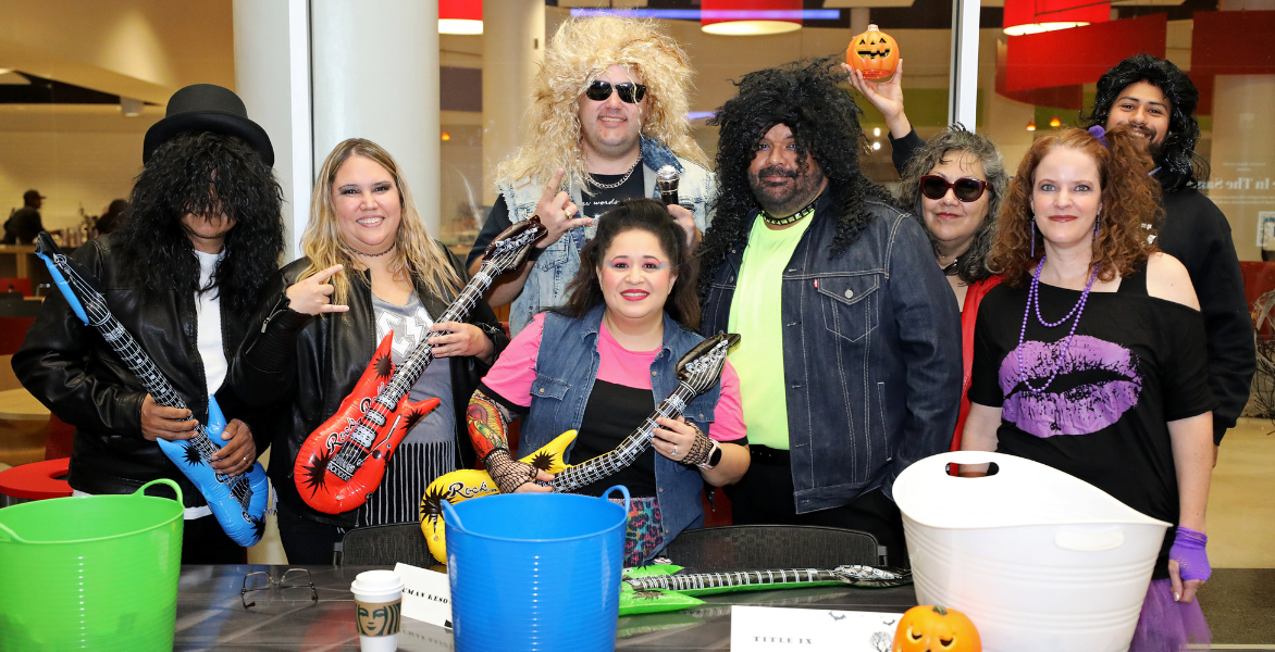Staff members dressed as rock stars for Halloween