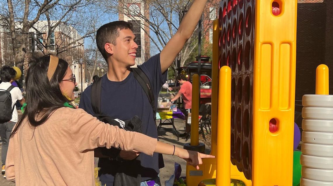 Students playing Connect Four