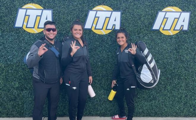 Dr. Edgardo Rivera Lopez with two tennis student-athletes