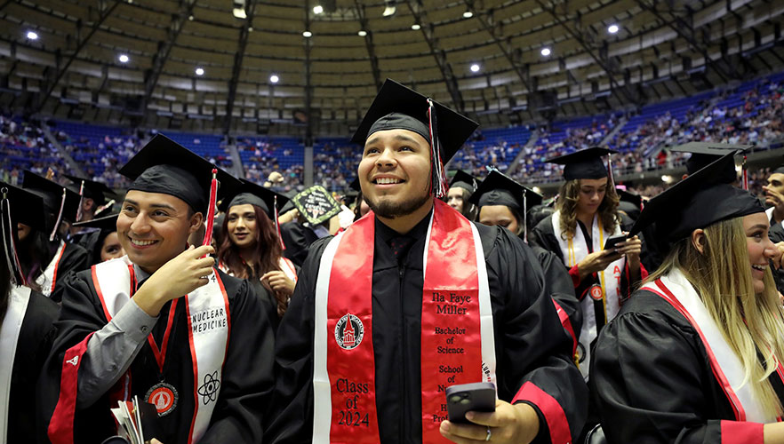 Smiling 2024 graduate