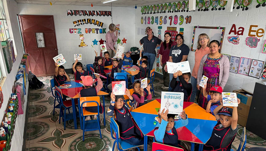 UIW community members helping in classroom