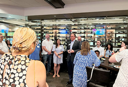 Dr. Evans talking with alumni