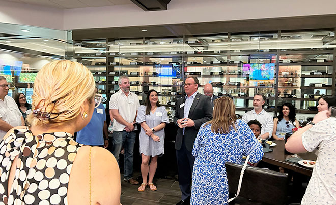 Dr. Evans talking with alumni