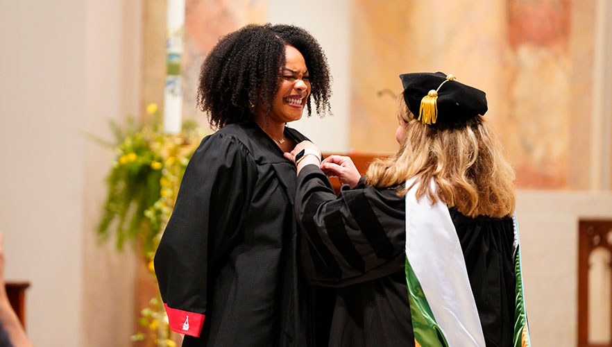 Nursing student at pinning ceremony