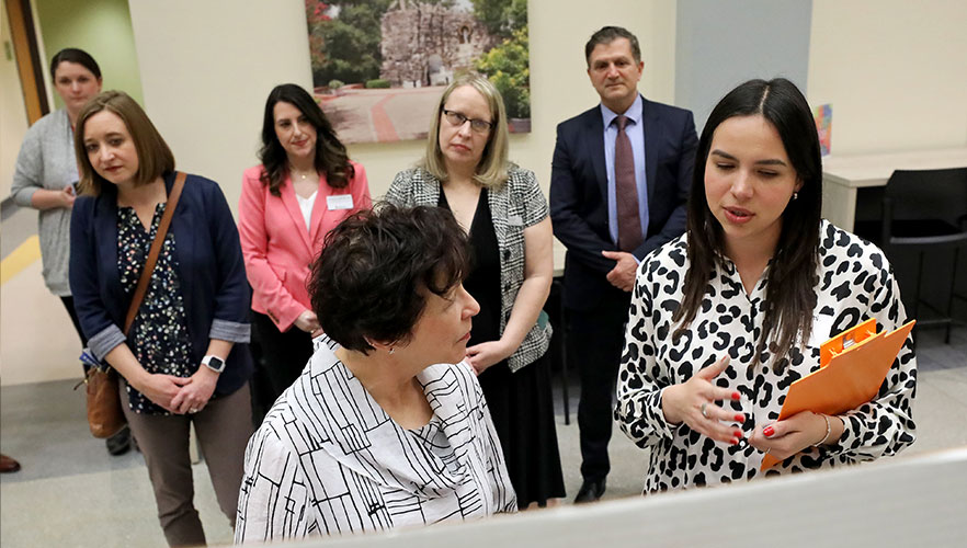 Ryder talking with people