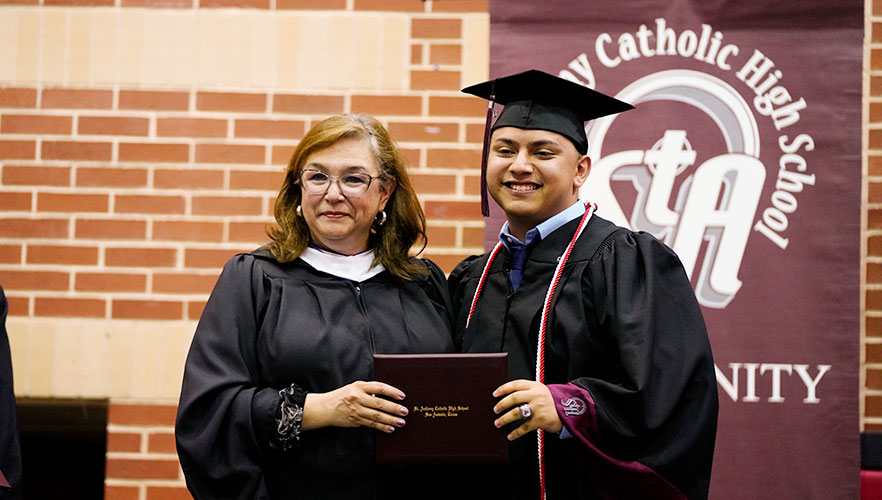 student with diploma