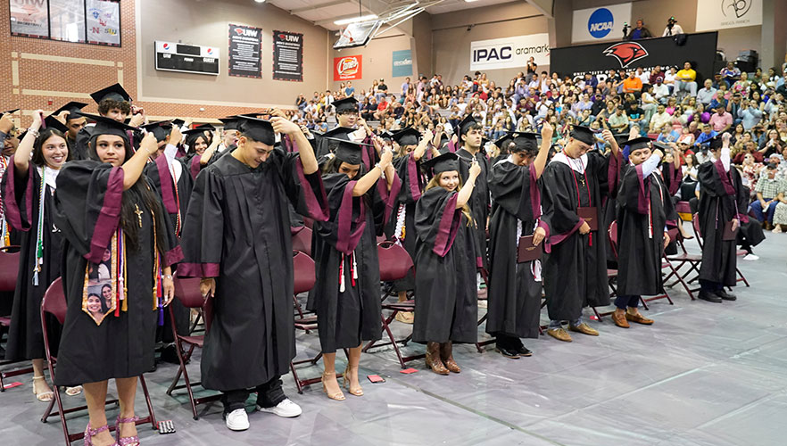graduates with caps