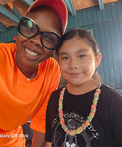 Camille Piper with ARISE kid