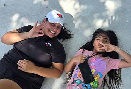 Trip volunteer with ARISE kid