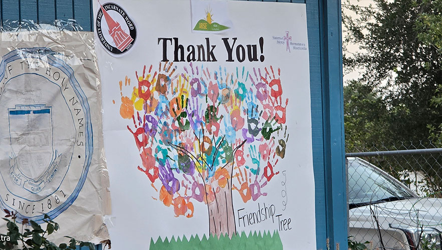 Thank You Friendship Tree made out of colorful hand prints