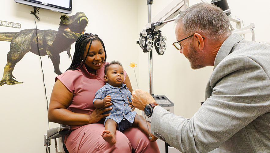 Child receiving eye exam