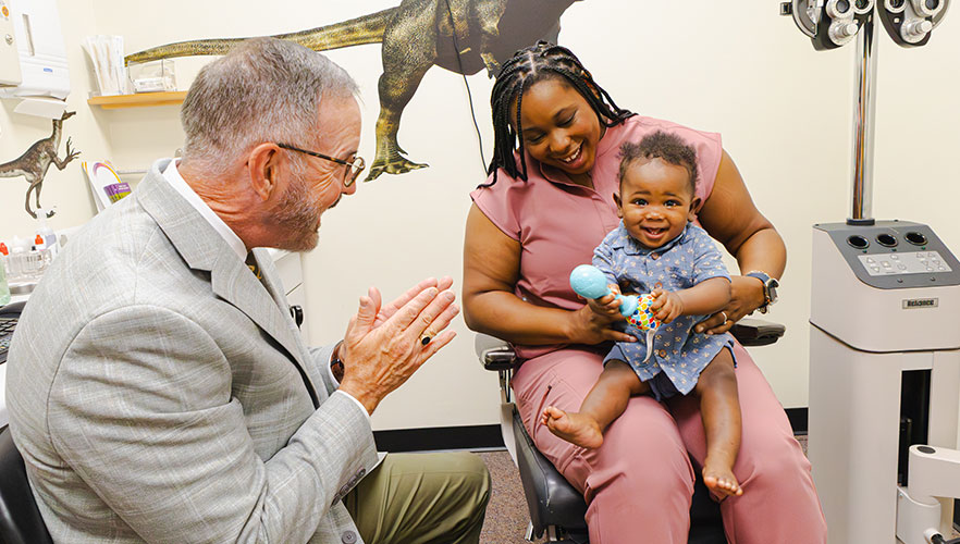 Child receiving eye exam