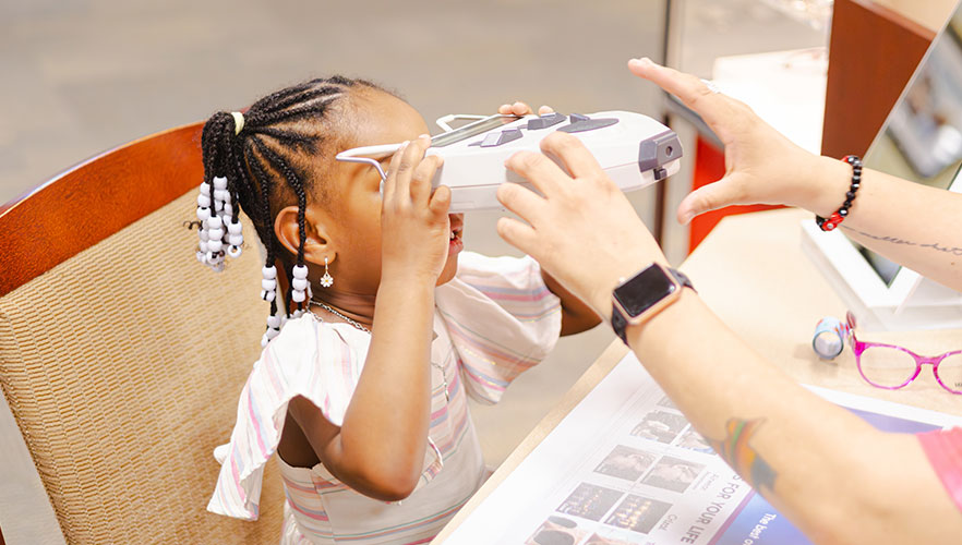 Child receiving eye exam