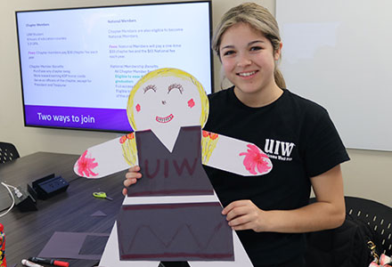 Student with their decorated Cardboard Kid