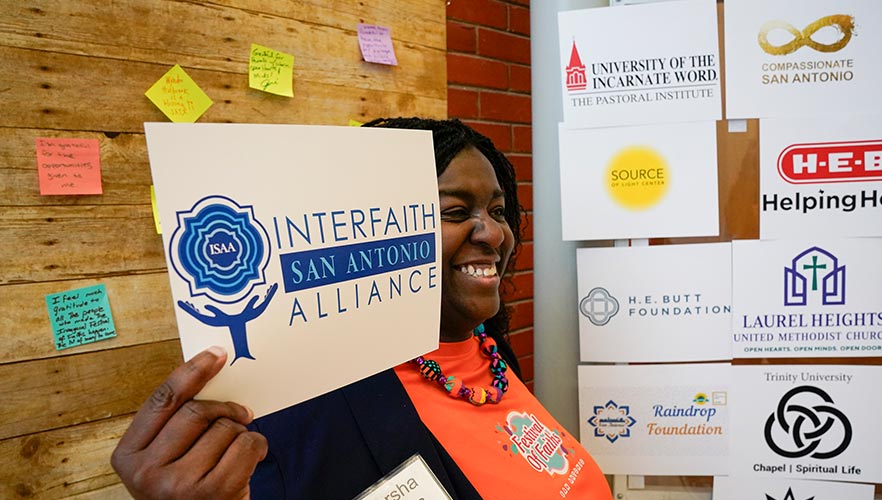 participant holding sign