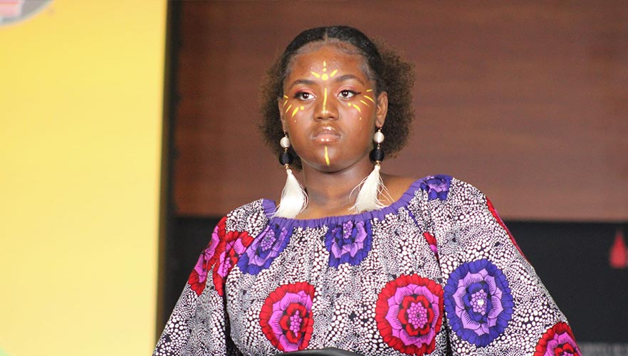 Fashion model wearing purple and pink