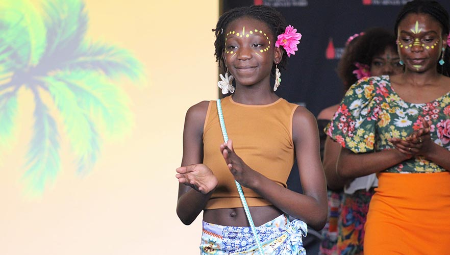 Fashion model walking stage clapping hands
