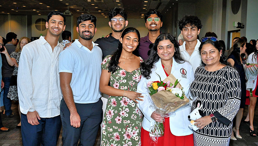 2025 FSOP White Coat Ceremony honoree with family