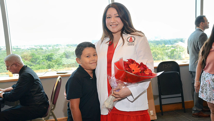 2025 FSOP White Coat Ceremony honoree with family