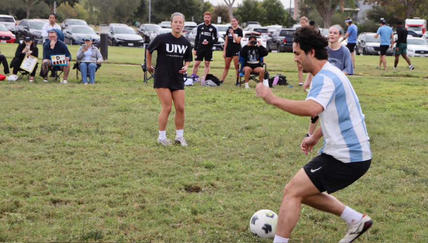 Students playing soccer