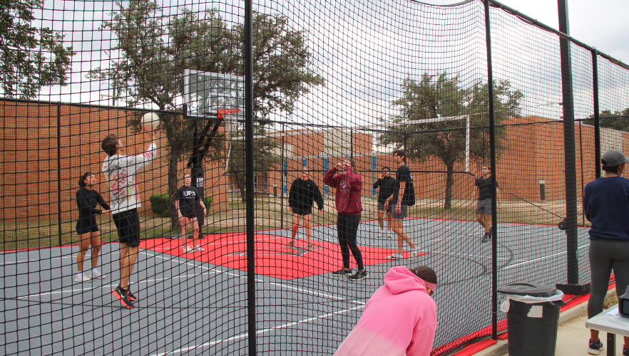 Students playing volleyball