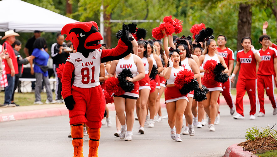 Red the Cardinal with UIW cheer team