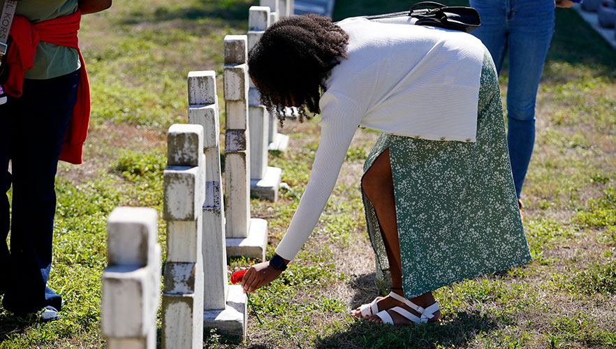 Flowers being placed on CCVI graves