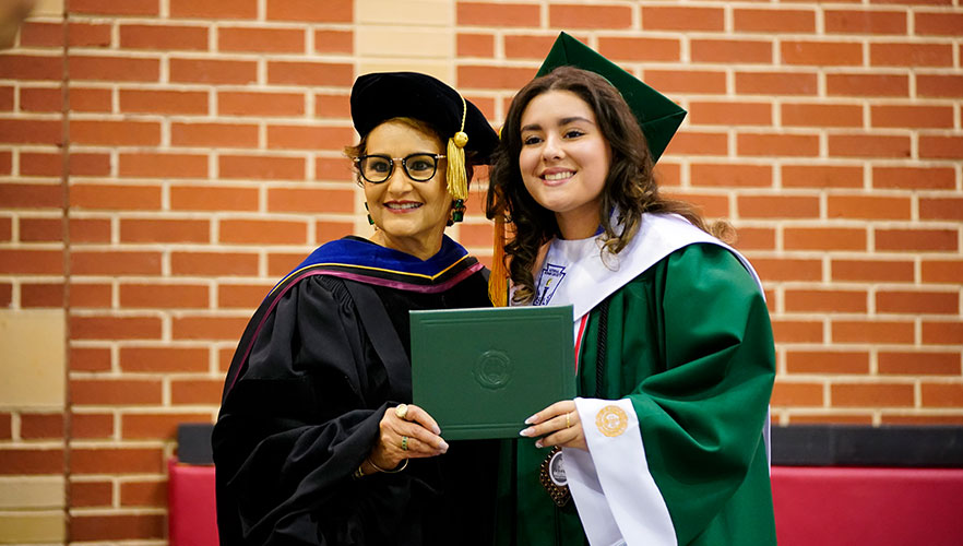 Incarnate Word High School graduate receiving diploma