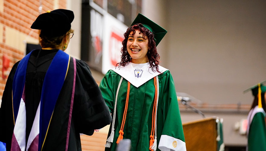Incarnate Word High School graduate receiving diploma