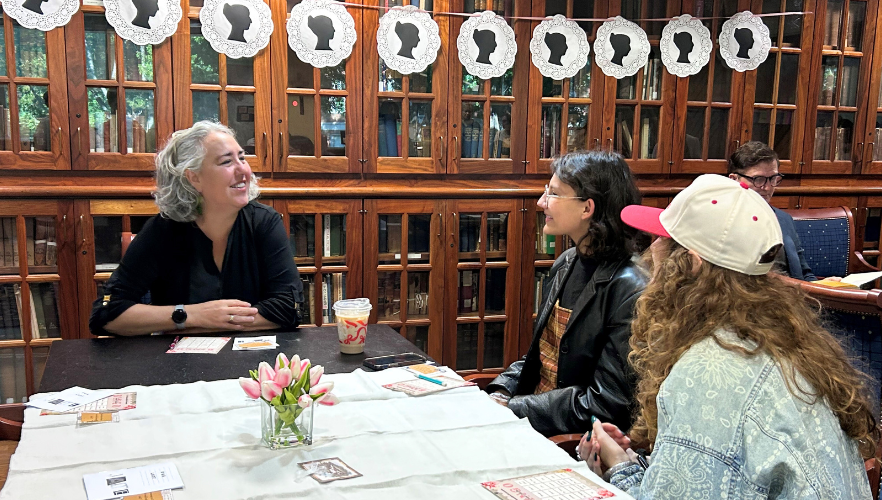 Dr. Eva Fernandez, University Provost, talking with students