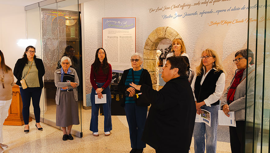 Sr. Mary Henry, CCVI presenting to guests in CCVI Heritage Center