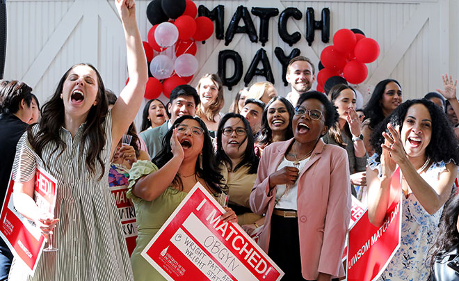 Matched students cheering