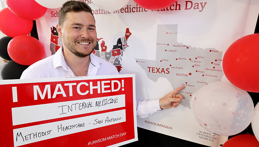 Student showing were the residency is on the map of the U.S.