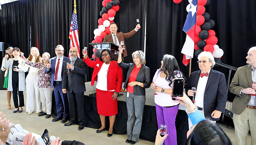 Dean Pham and UIWSOM faculty celebrating matched students