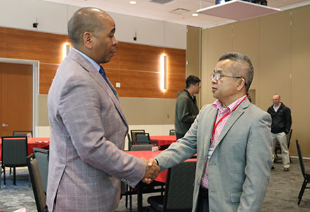 Chaplain Davis with symposium attendee