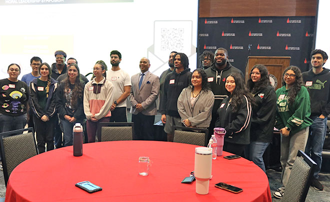 Chaplain Davis with symposium attendees