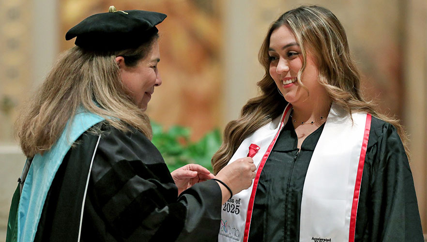 Nursing student receiving pin