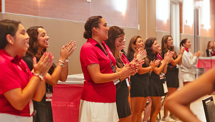 Student orientation leaders welcoming guests