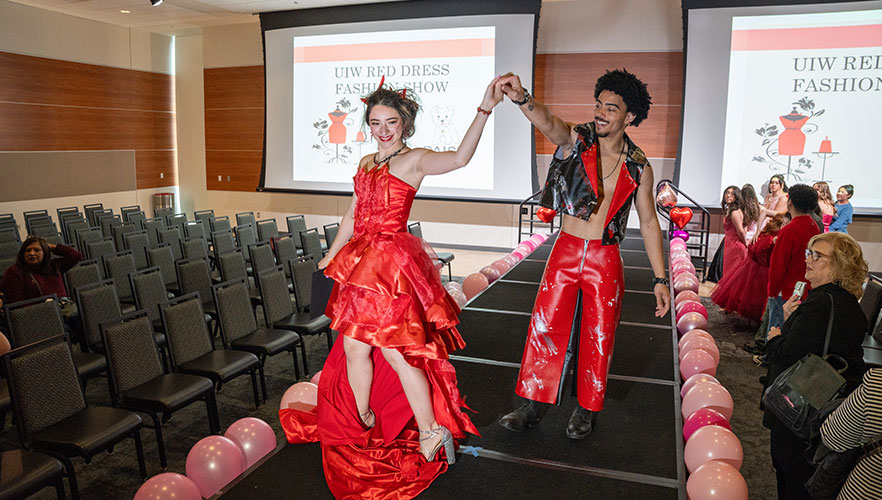 Red Dress students posing