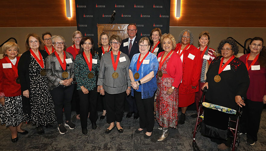 Dr. Thomas M. Evans with reunion attendees
