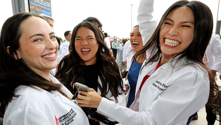 Students celebrating at ceremony