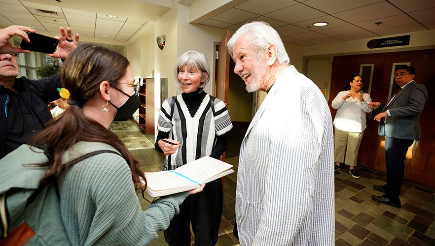 Guests conversing with Kathy and Lionel Sosa