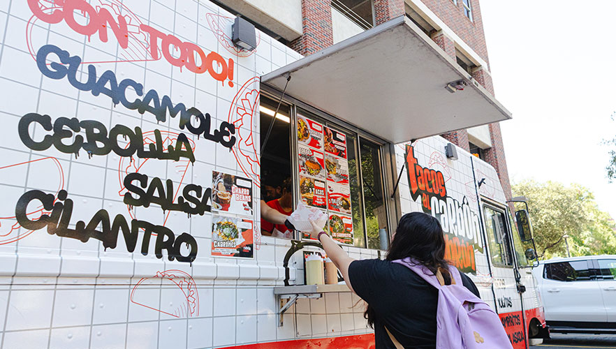 Student getting tacos